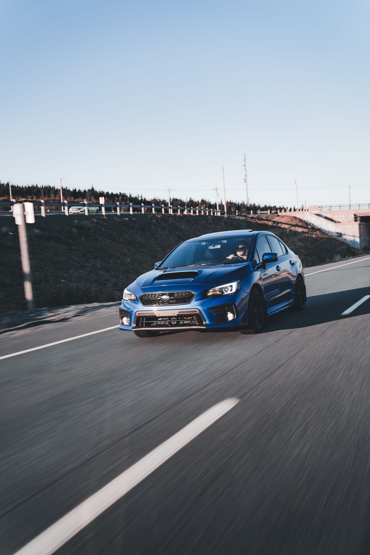 Blue performance coupe, an illustrative image for the fictional SAA E electric concept
